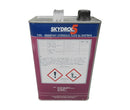 A purple gallon can of Skydrol 5 Fire Resistant Hydraulic Fluid with label and warning signs.
